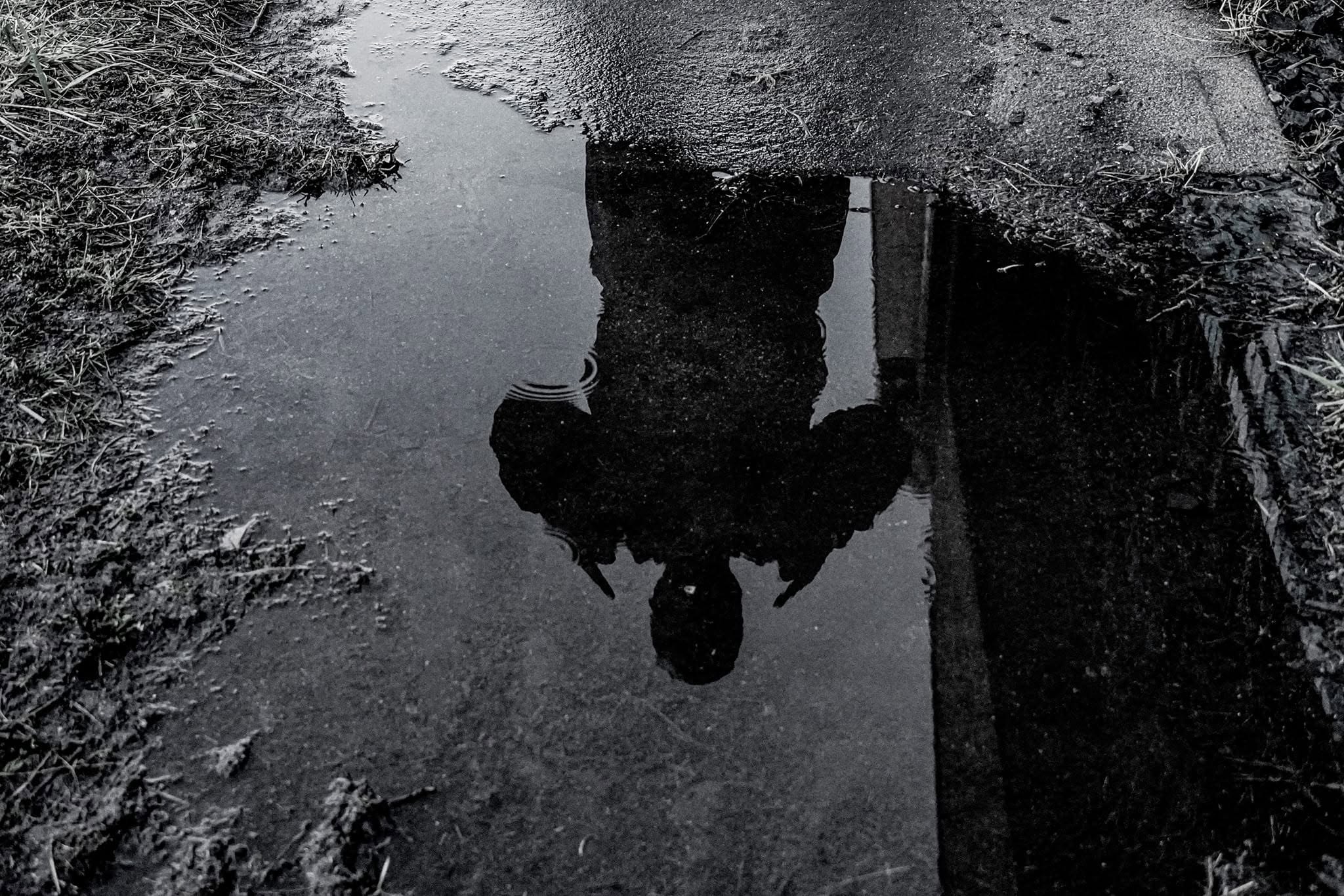 Black-and-white conceptual reflection photograph by J Sturgis Media